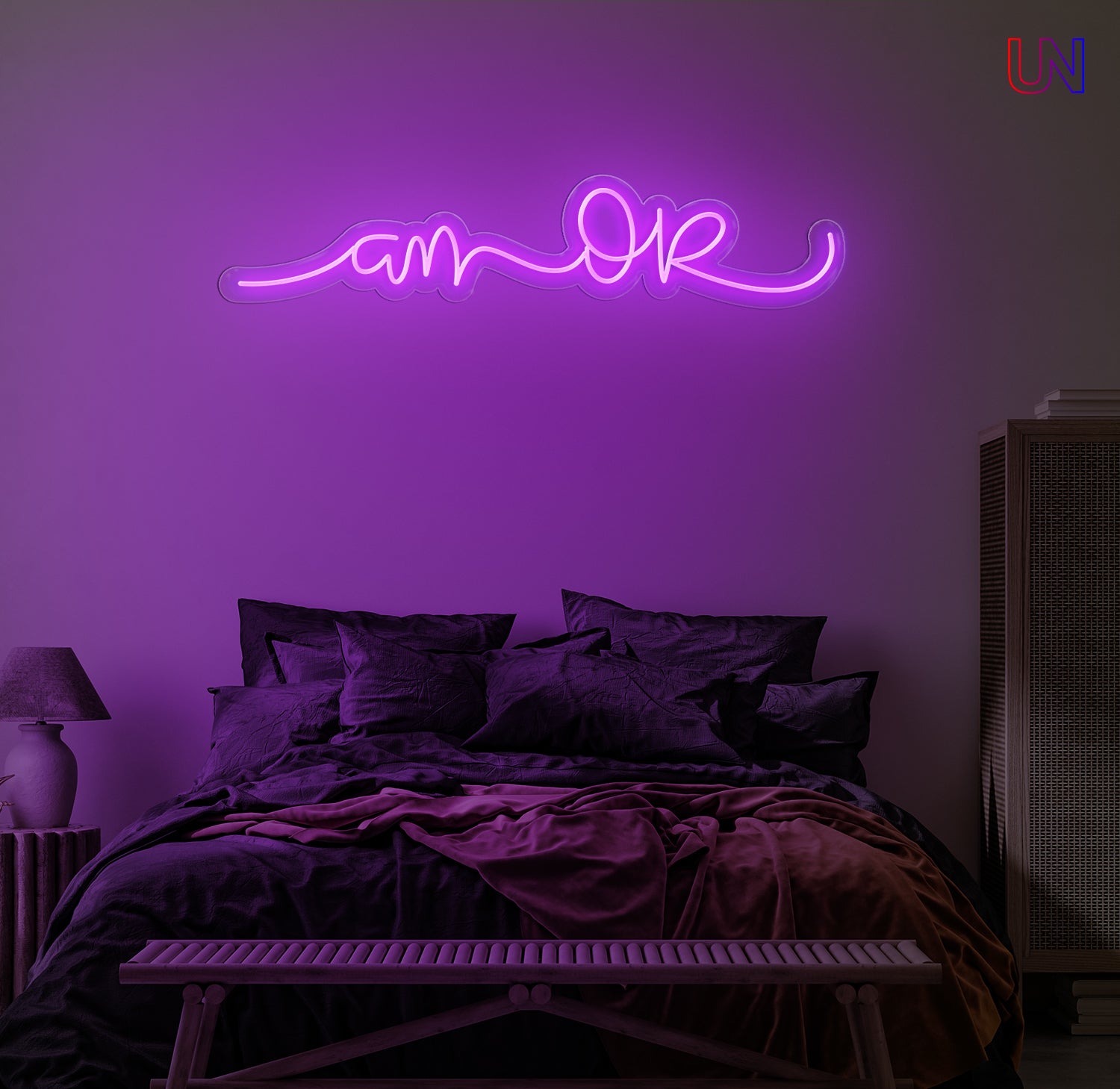 “Am Okay” handwritten-style custom neon sign glowing softly above a cozy bed setup