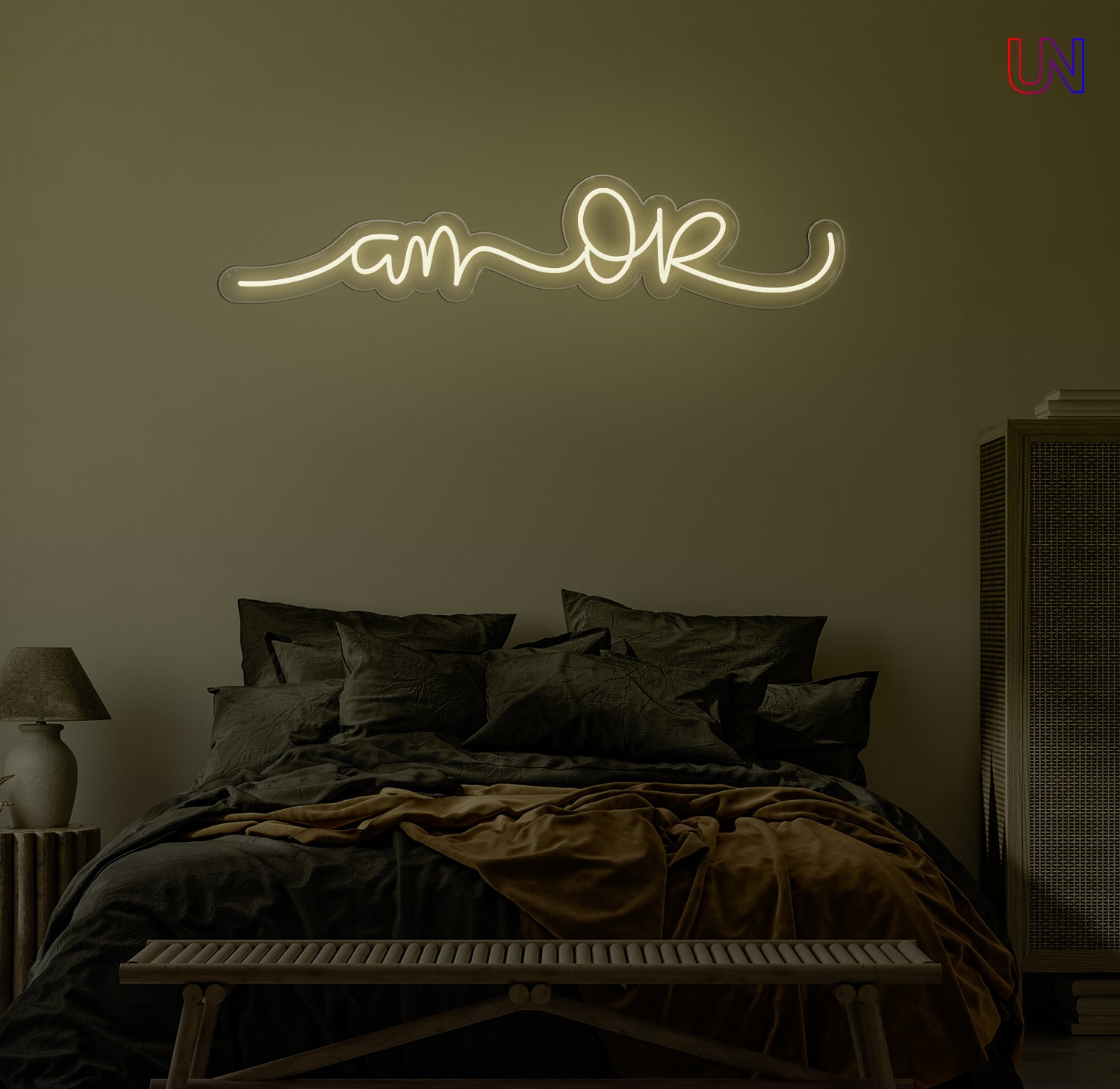 “Am Okay” handwritten-style custom neon sign glowing softly above a cozy bed setup