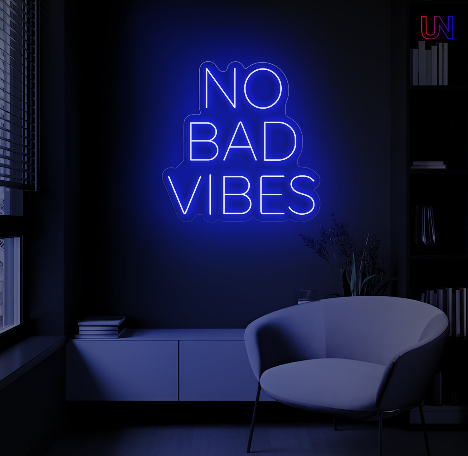 No Bad Vibes LED Neon Sign mounted on wall in modern lounge room with glowing ambient light