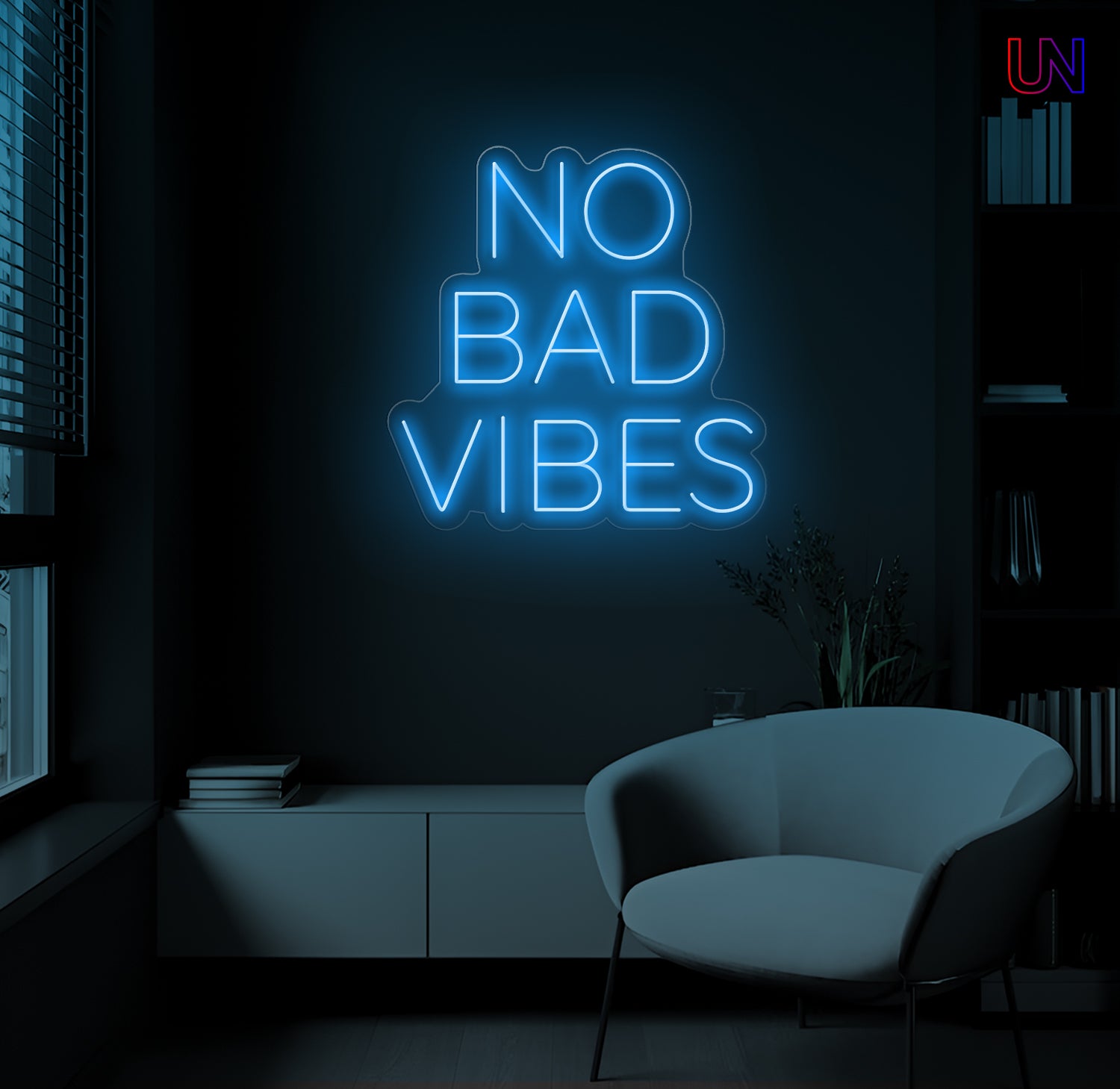 No Bad Vibes LED Neon Sign mounted on wall in modern lounge room with glowing ambient light