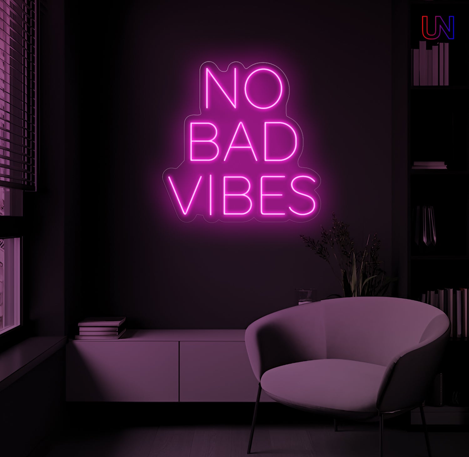 No Bad Vibes LED Neon Sign mounted on wall in modern lounge room with glowing ambient light