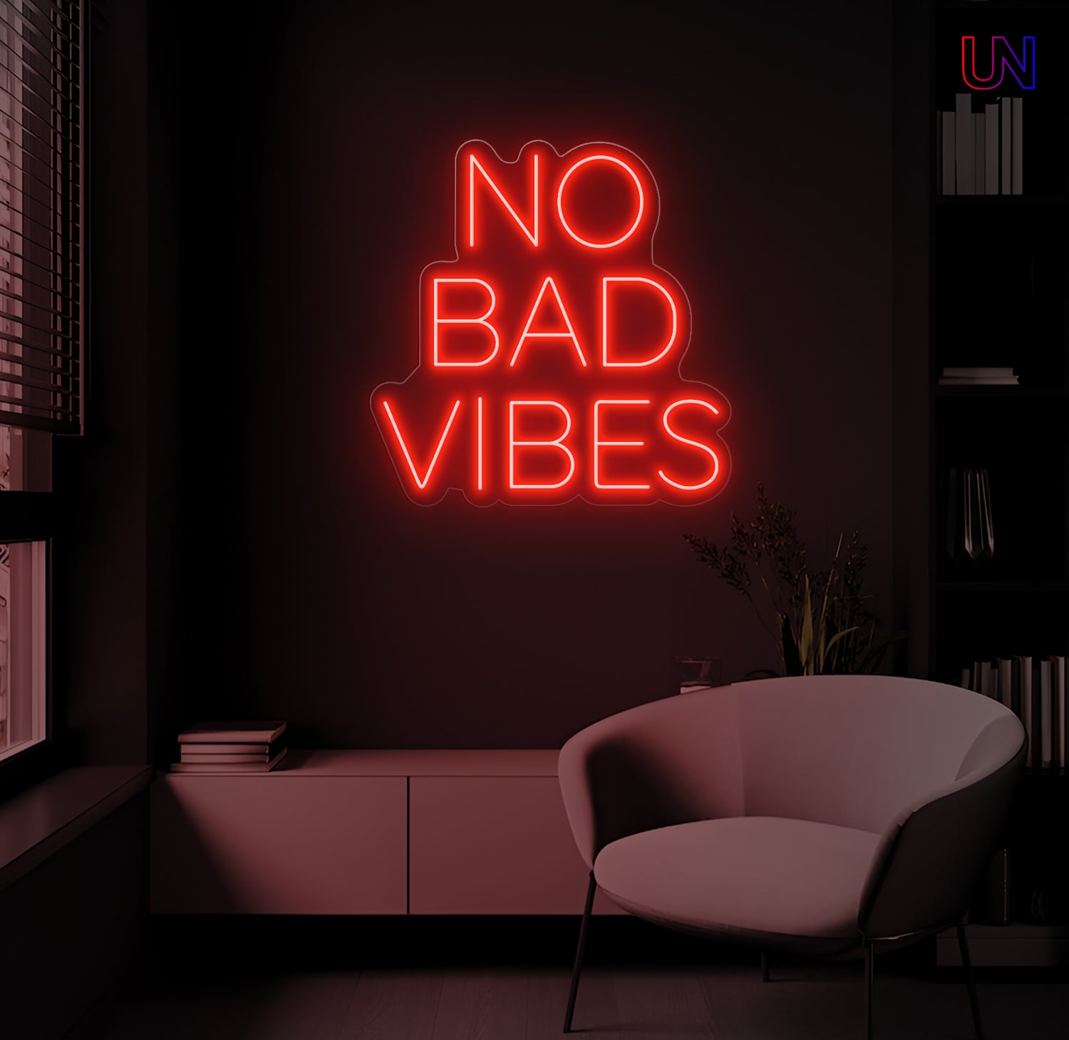 Neon sign reading 'No Bad Vibes' in a dark room with a chair.