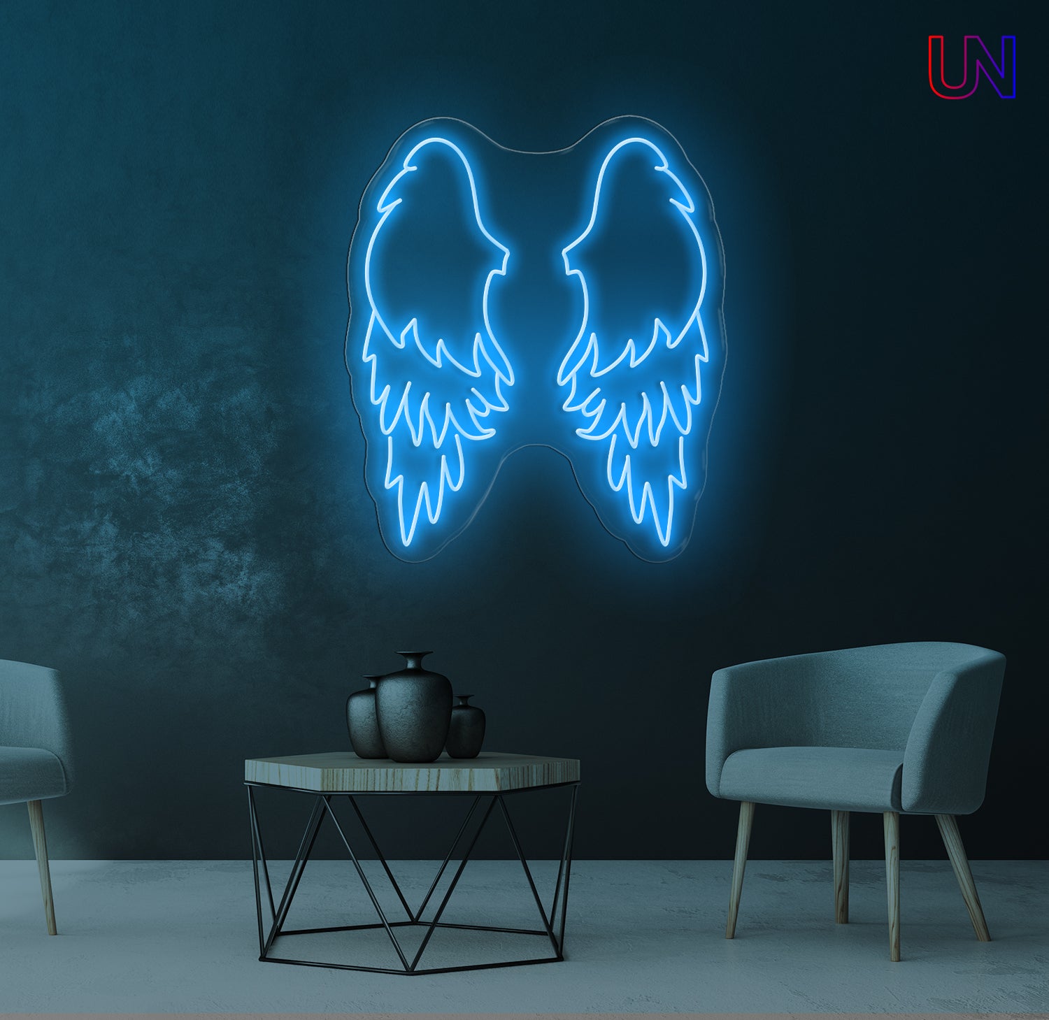 Neon angel wings light fixture on a dark wall with a modern living room setup.