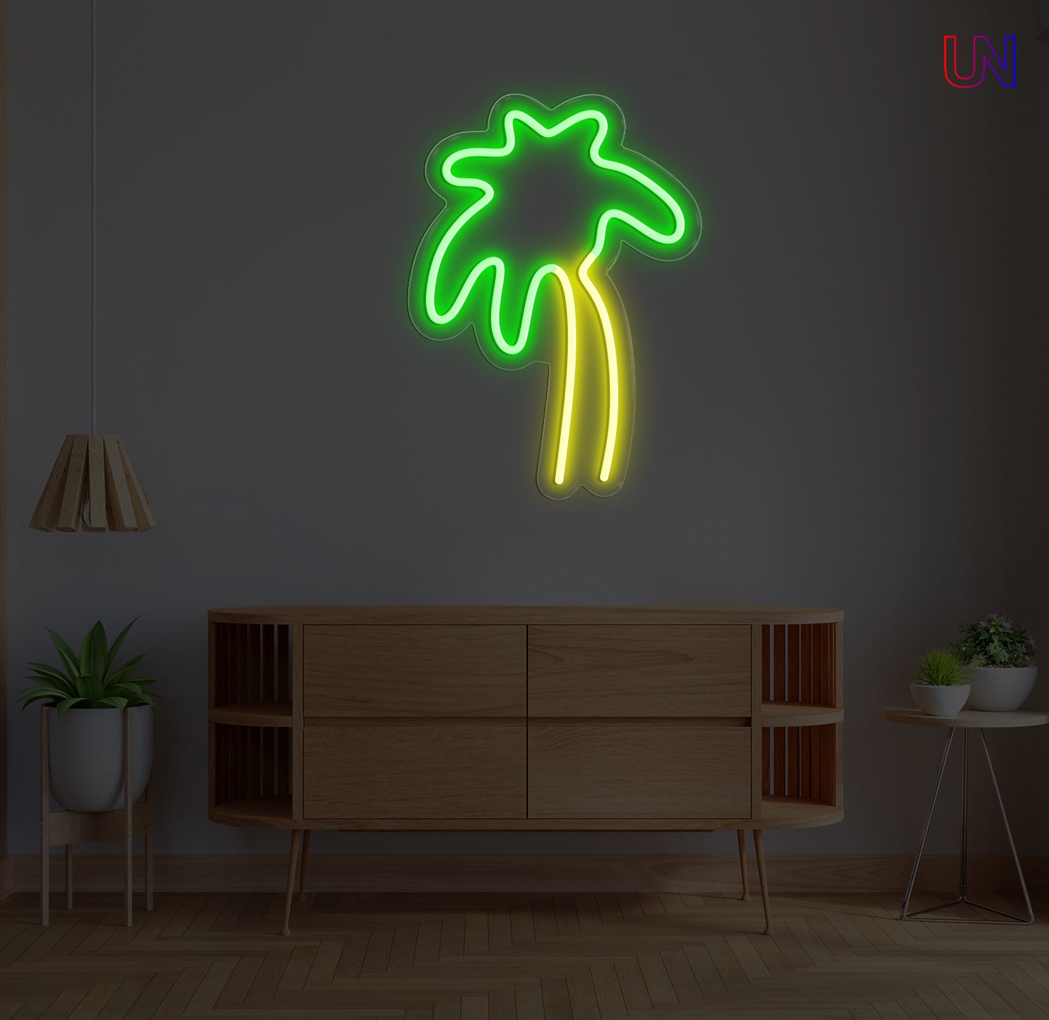 Neon palm tree sign on a dark wall with wooden furniture and plants.