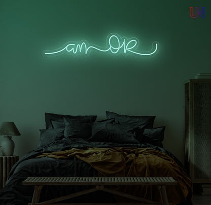 “Am Okay” handwritten-style custom neon sign glowing softly above a cozy bed setup