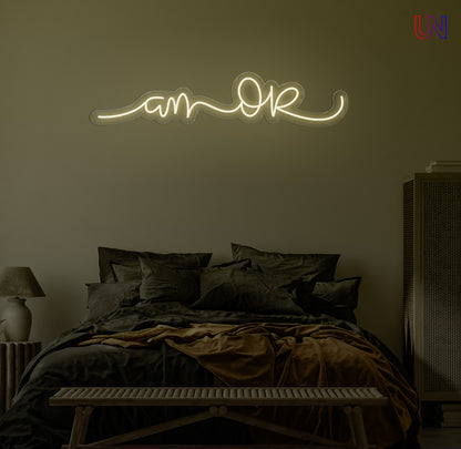 “Am Okay” handwritten-style custom neon sign glowing softly above a cozy bed setup