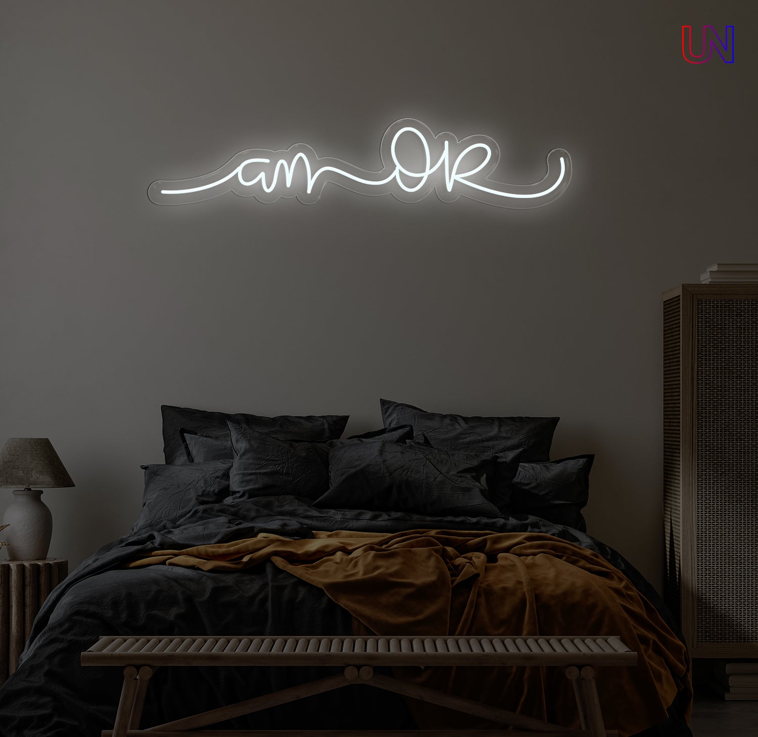 “Am Okay” handwritten-style custom neon sign glowing softly above a cozy bed setup