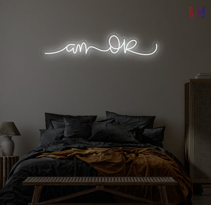 “Am Okay” handwritten-style custom neon sign glowing softly above a cozy bed setup