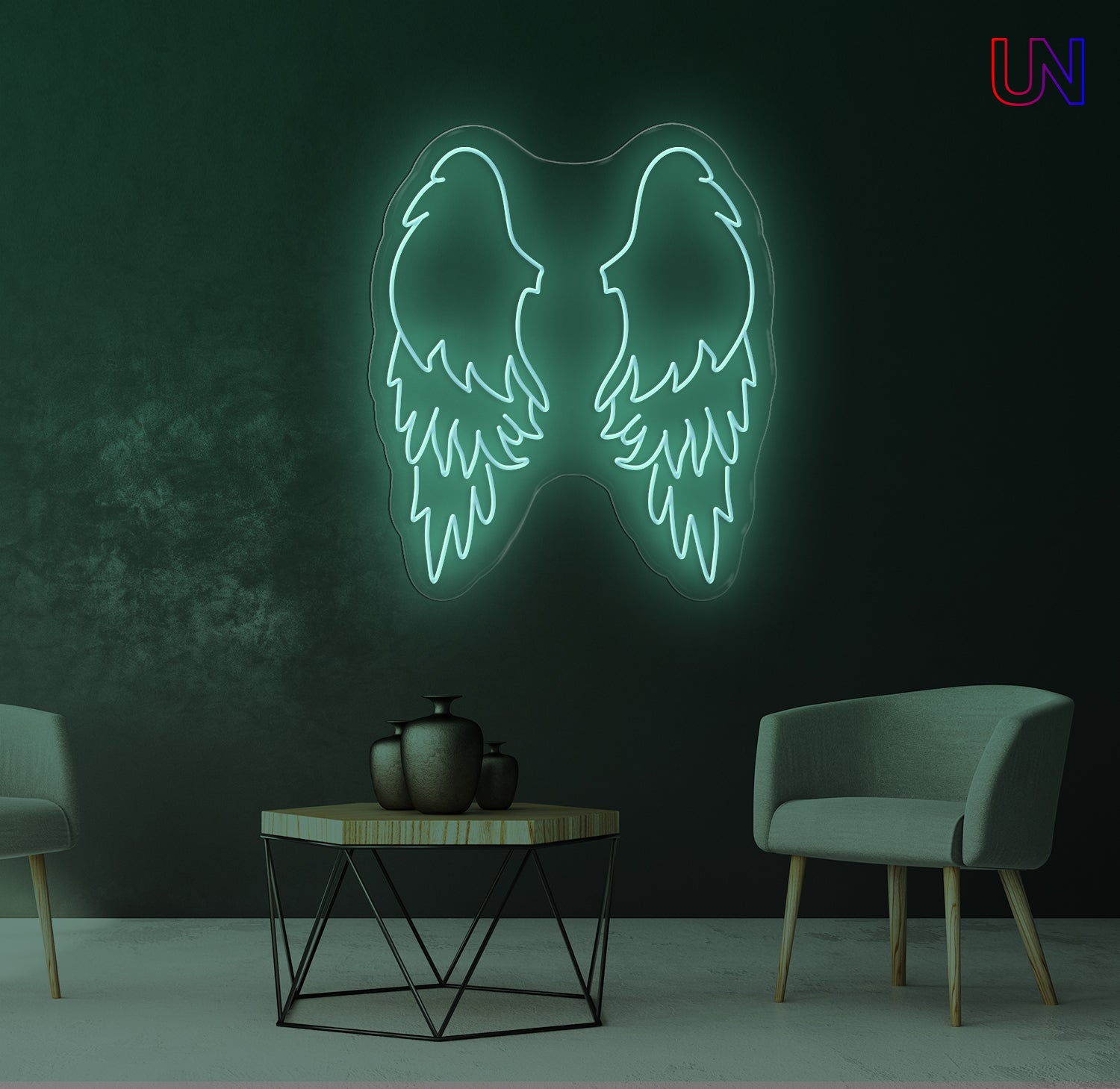 Neon angel wings on a dark wall with a table and chairs in the foreground.